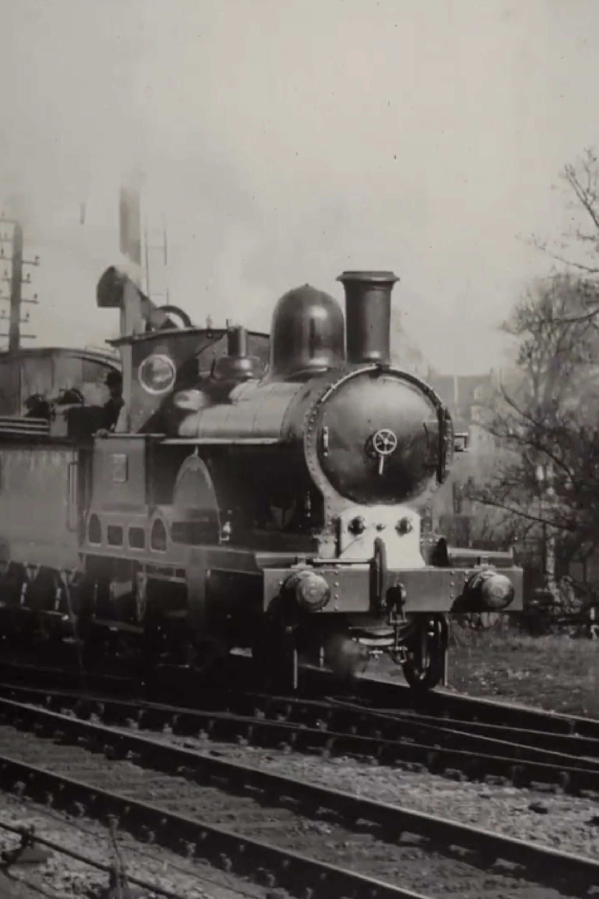 Irish Mail – L.& N.W. Railway – Taking up Water at Full Speed